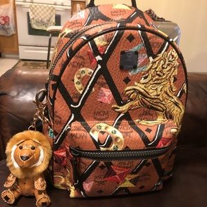 MCM stark motif Rombi backpack printed lion purse
